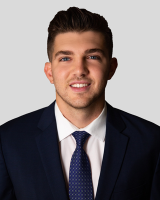 Portrait of Arian Hoxha, Licensed Real Estate Advisor